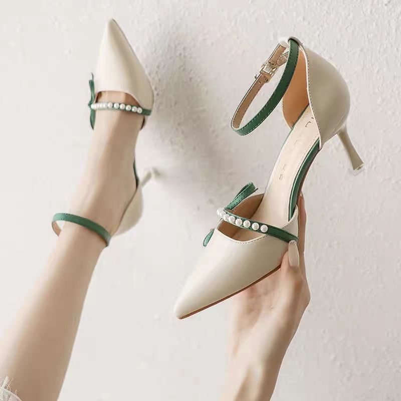 Women wearing thin-soled high heels