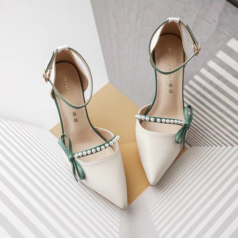 Women wearing thin-soled high heels