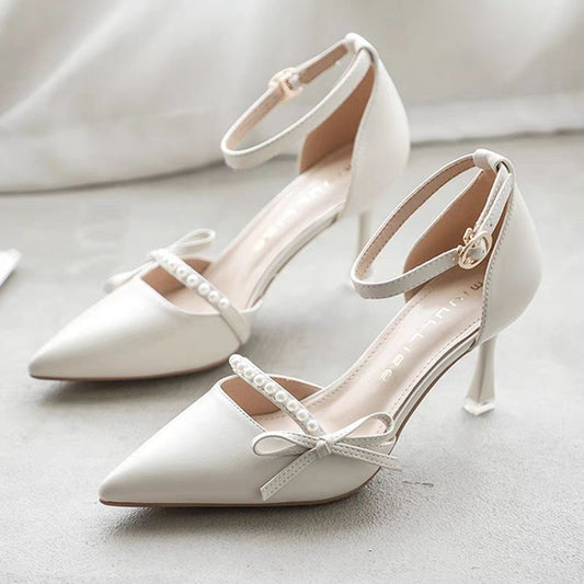 Women wearing thin-soled high heels
